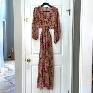 Never worn, floral maxi with side waist cut outs. Fully lined.